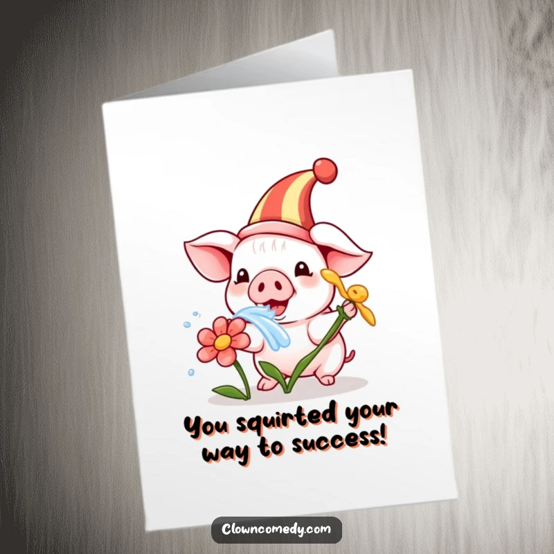 Funny Free Printable Congratulations Card: A happy piglet clown in a small hat squirting water playfully.