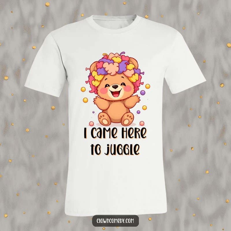 Funny t-shirt of a giggling bear cub in a bright clown wig, playfully juggling several small balls.