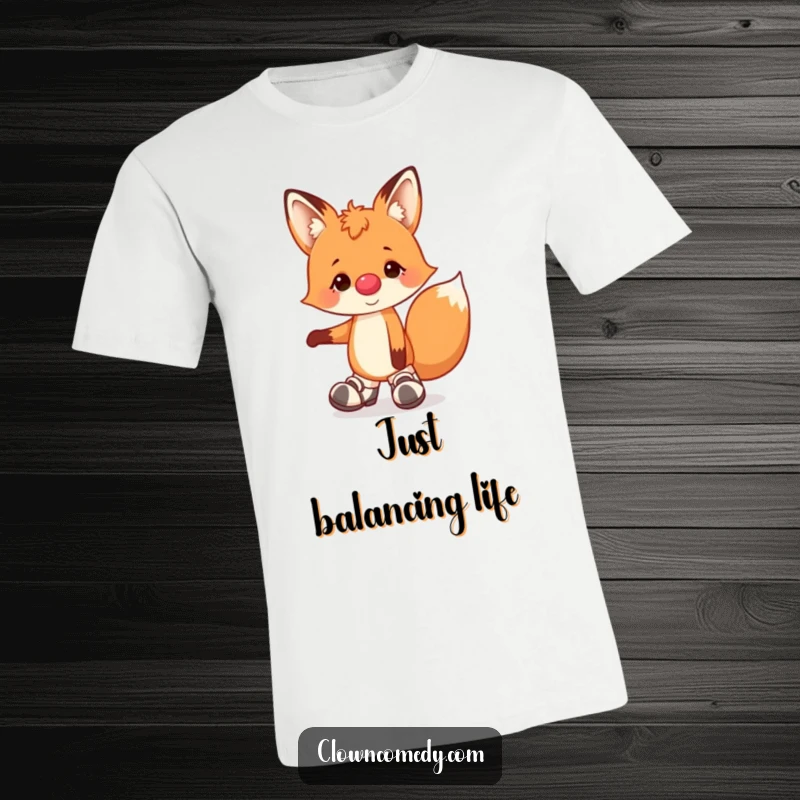 Funny t-shirt featuring a cheerful fox in a clown nose and floppy shoes, skillfully balancing on one paw, radiating pure joy.